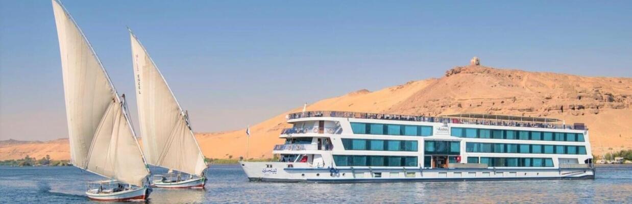 MS Amwaj luxury Nile cruise ship sailing on the Nile River with desert views in Egypt
