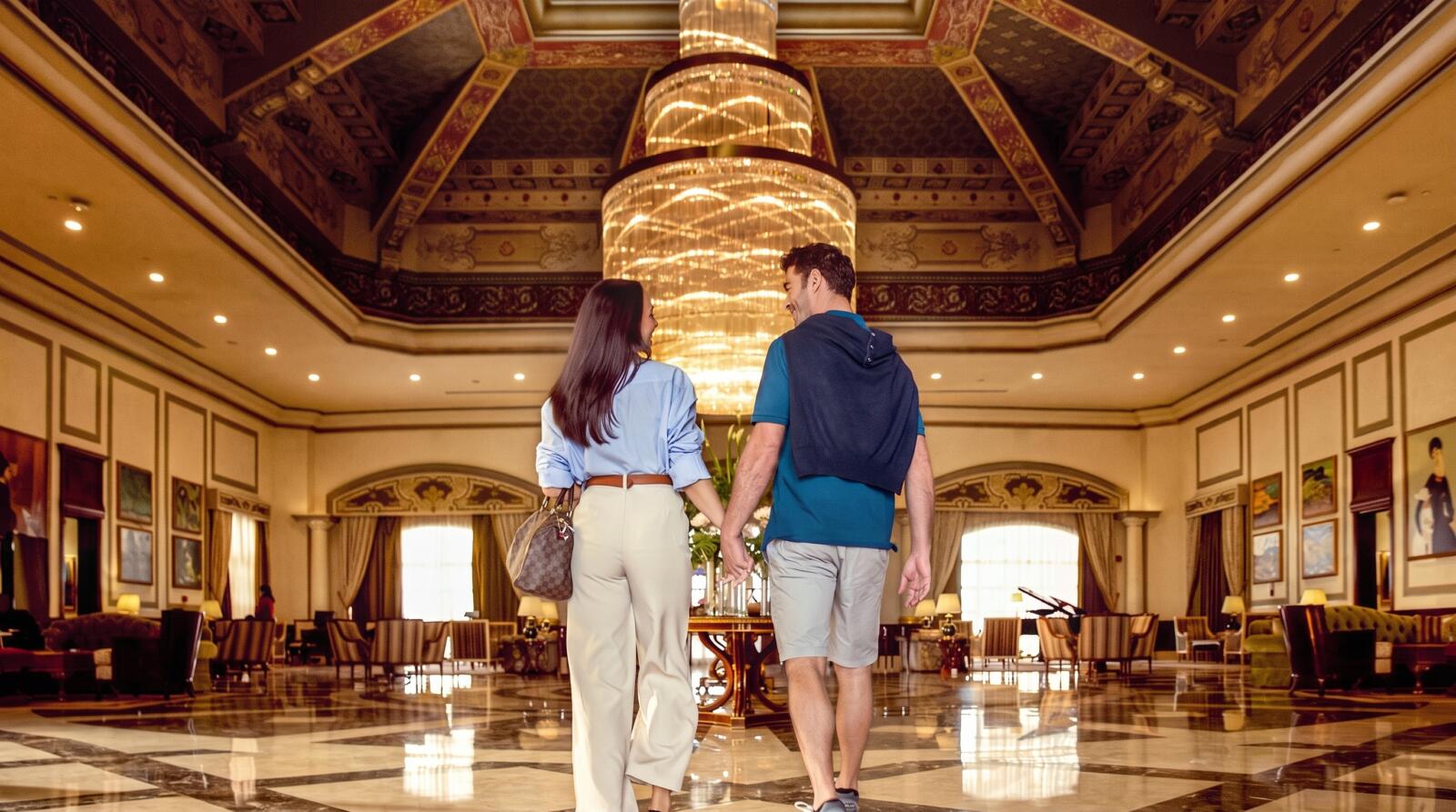 Hotel concierge assisting guest with luxury Cairo hotel booking