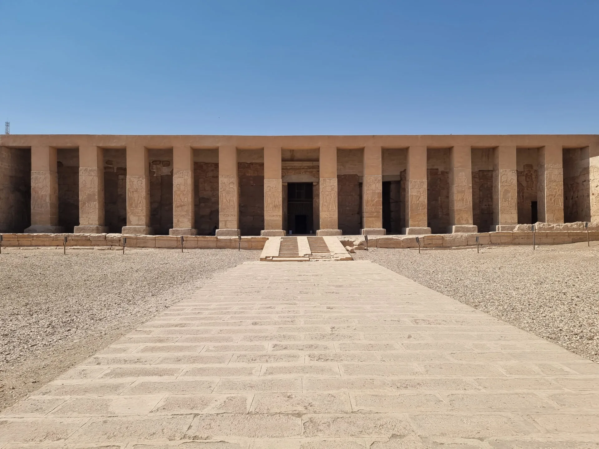 The majestic stone entrance of the Temple of Seti I in Abydos, captured during a private tour with Top Class Egypt Travel.